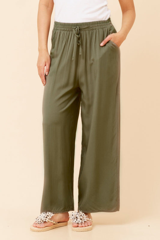 Image of a model wearing Pants. Product name - SUZZEL SOLID WIDE LEG PANTS in Khaki colour by brand - Caroline Morgan Australia