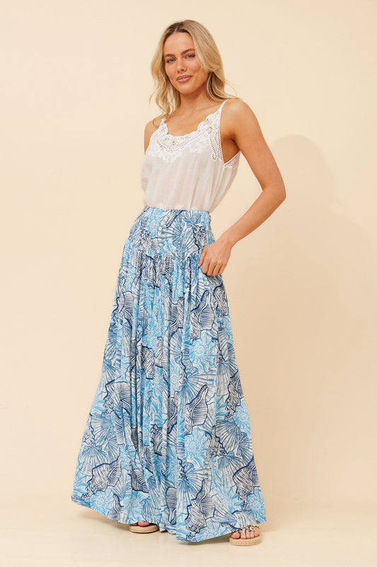 Image of a model wearing Pants. Product name - SEGAL SHELL PRINT PANTS in Aqua colour by brand - MYSTIC MONSOON