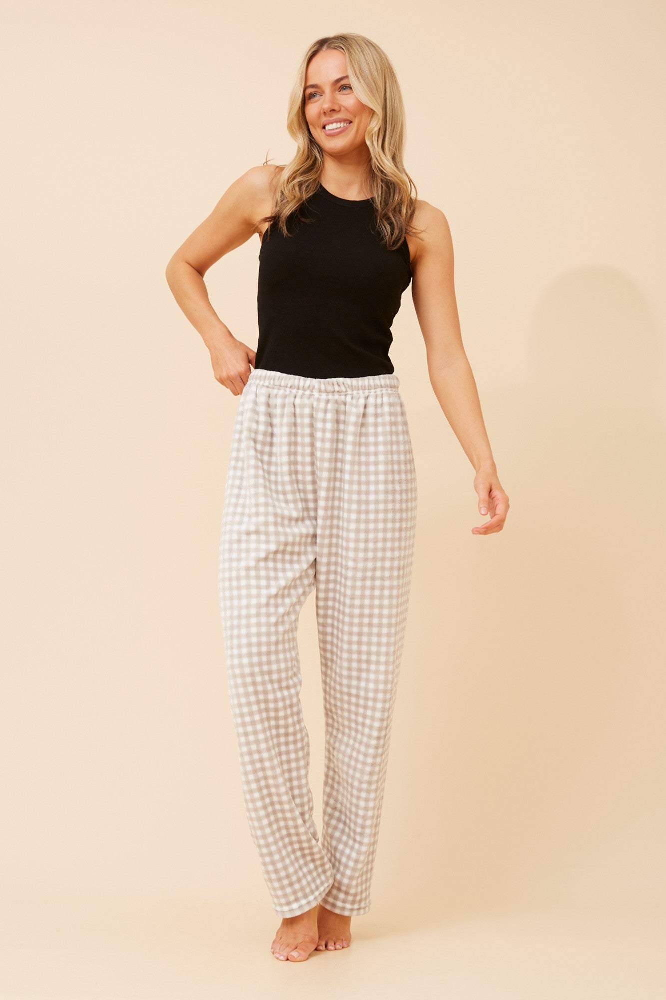 Image of a model wearing Pants. Product name - LEE CHECK PRINT PYJAMA PANTS in Multi Black colour by brand - Caroline Morgan Australia