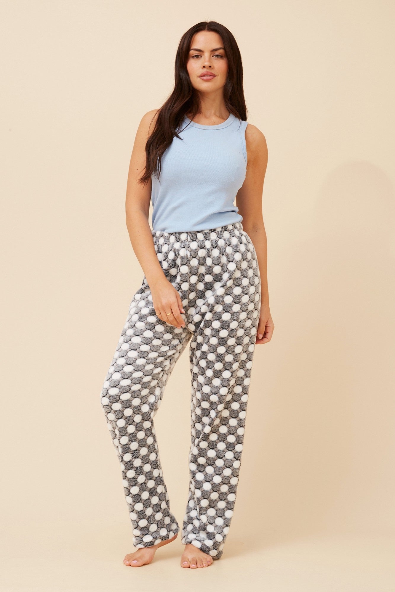 Image of a model wearing Pants. Product name - LEE POLKA DOT PRINT PYJAMA PANTS in Grey colour by brand - Caroline Morgan Australia