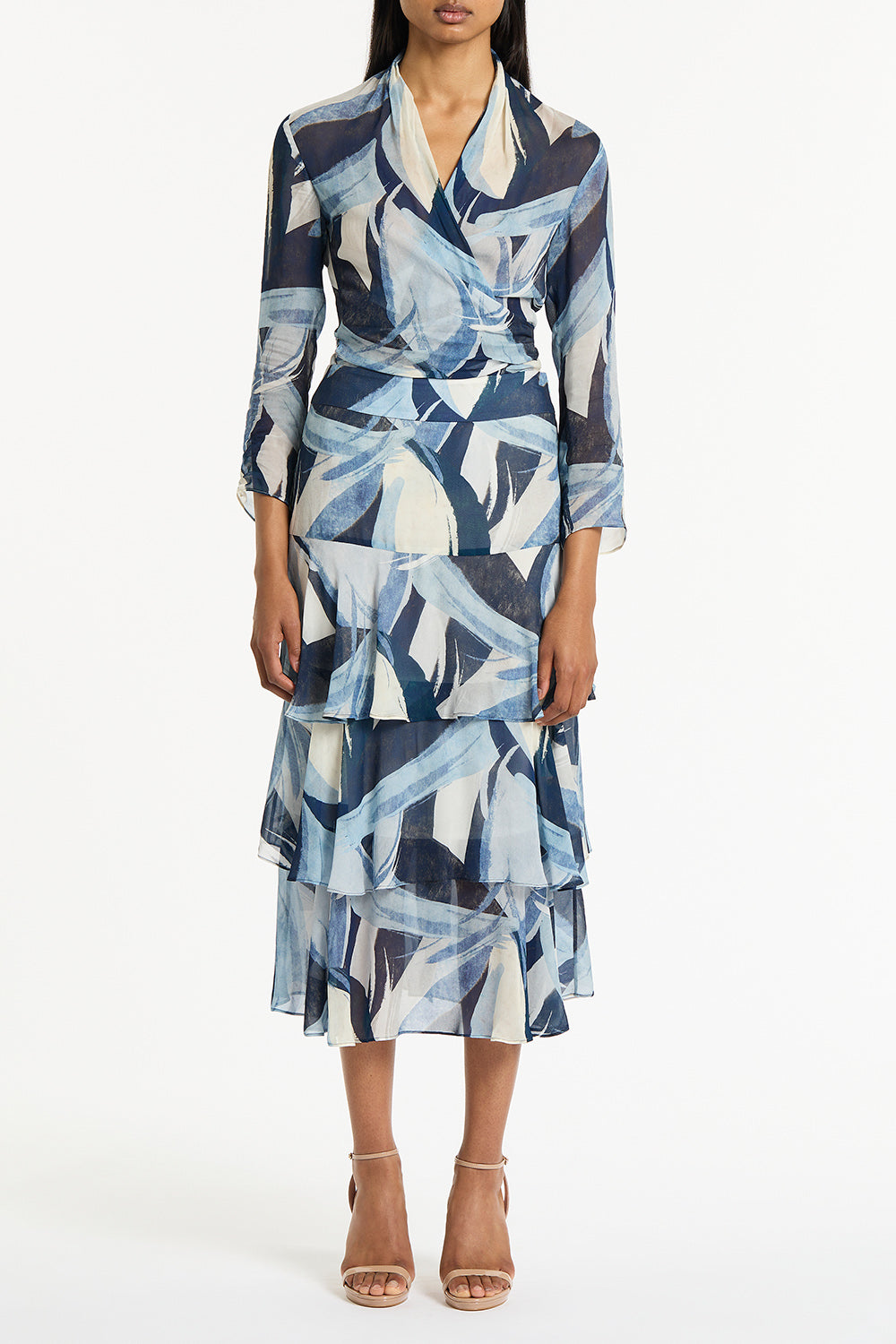 Image of a model wearing Skirts. Product name - Painted Floral Georgette Tiered Skirt in Blue colour by brand - Carla Zampatti