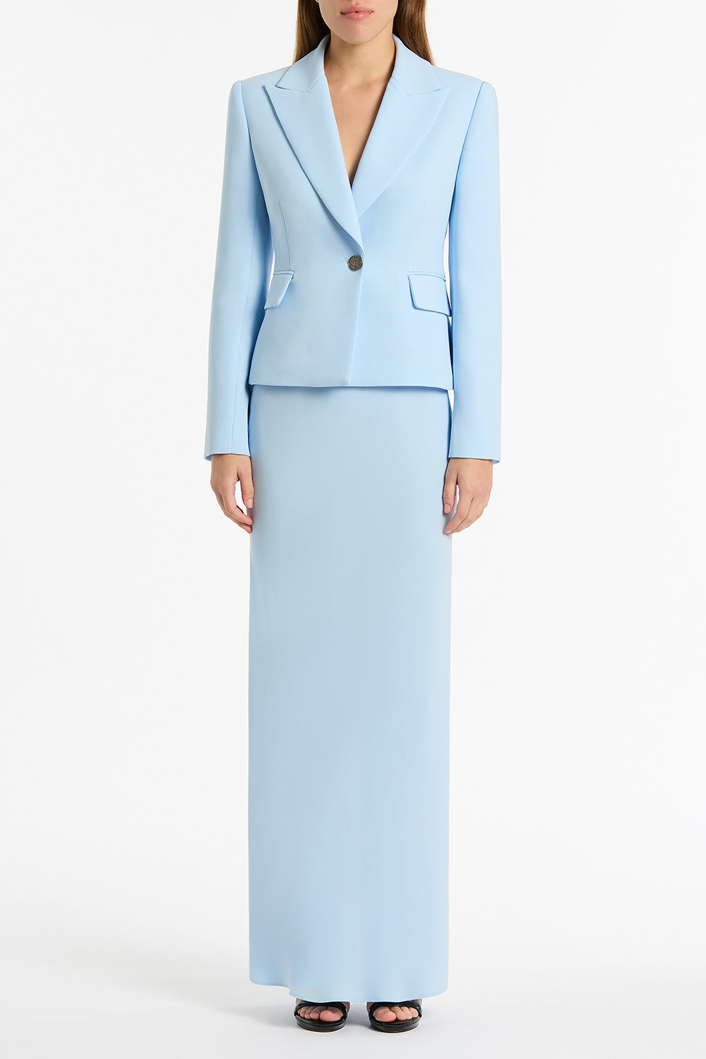 Image of a model wearing Skirts. Product name - Pale Blue Crepe Bias Skirt in Blue colour by brand - Carla Zampatti