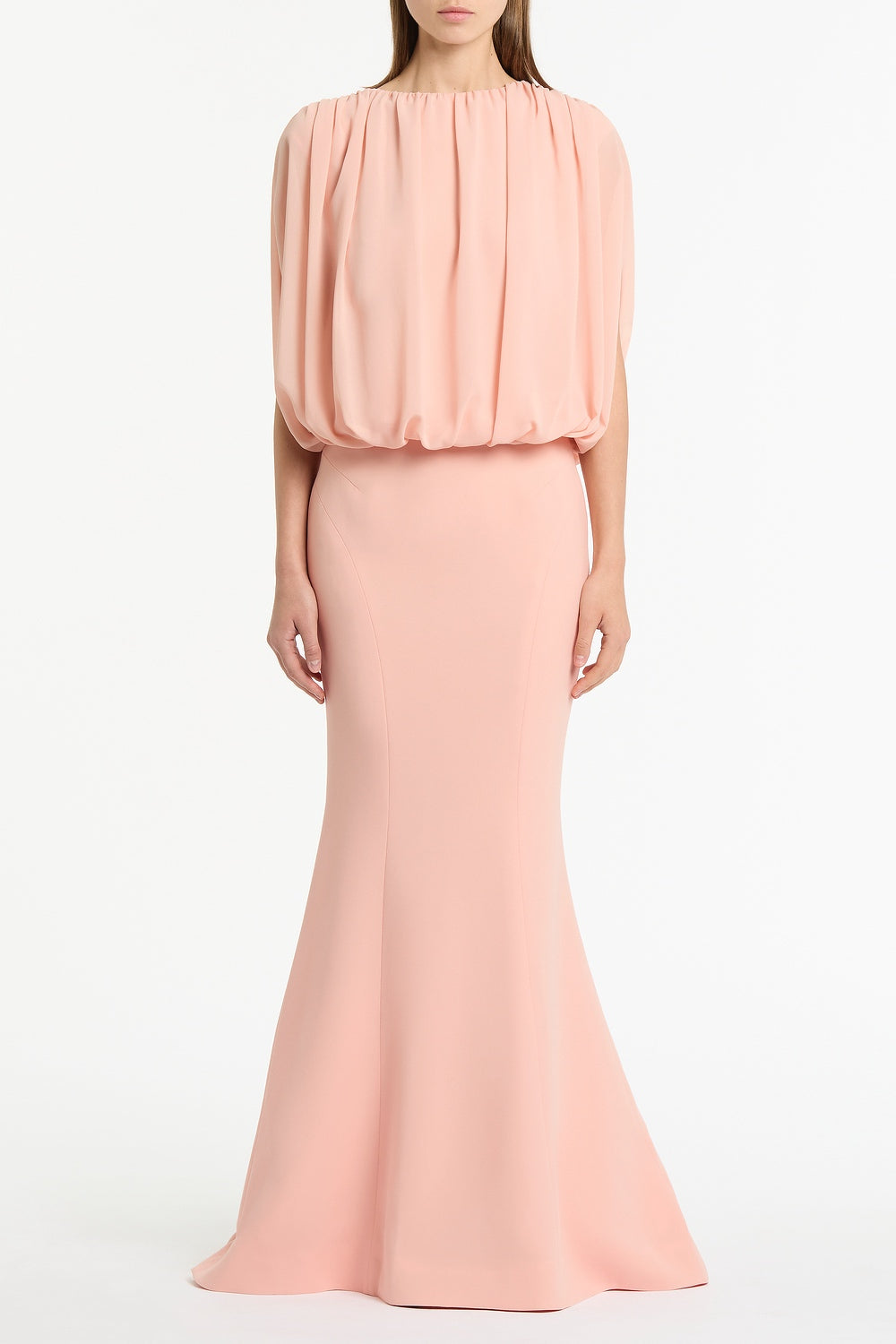 Image of a model wearing Skirts. Product name - Pale Rose Crepe Fishtail Maxi Skirt in Pink colour by brand - Carla Zampatti