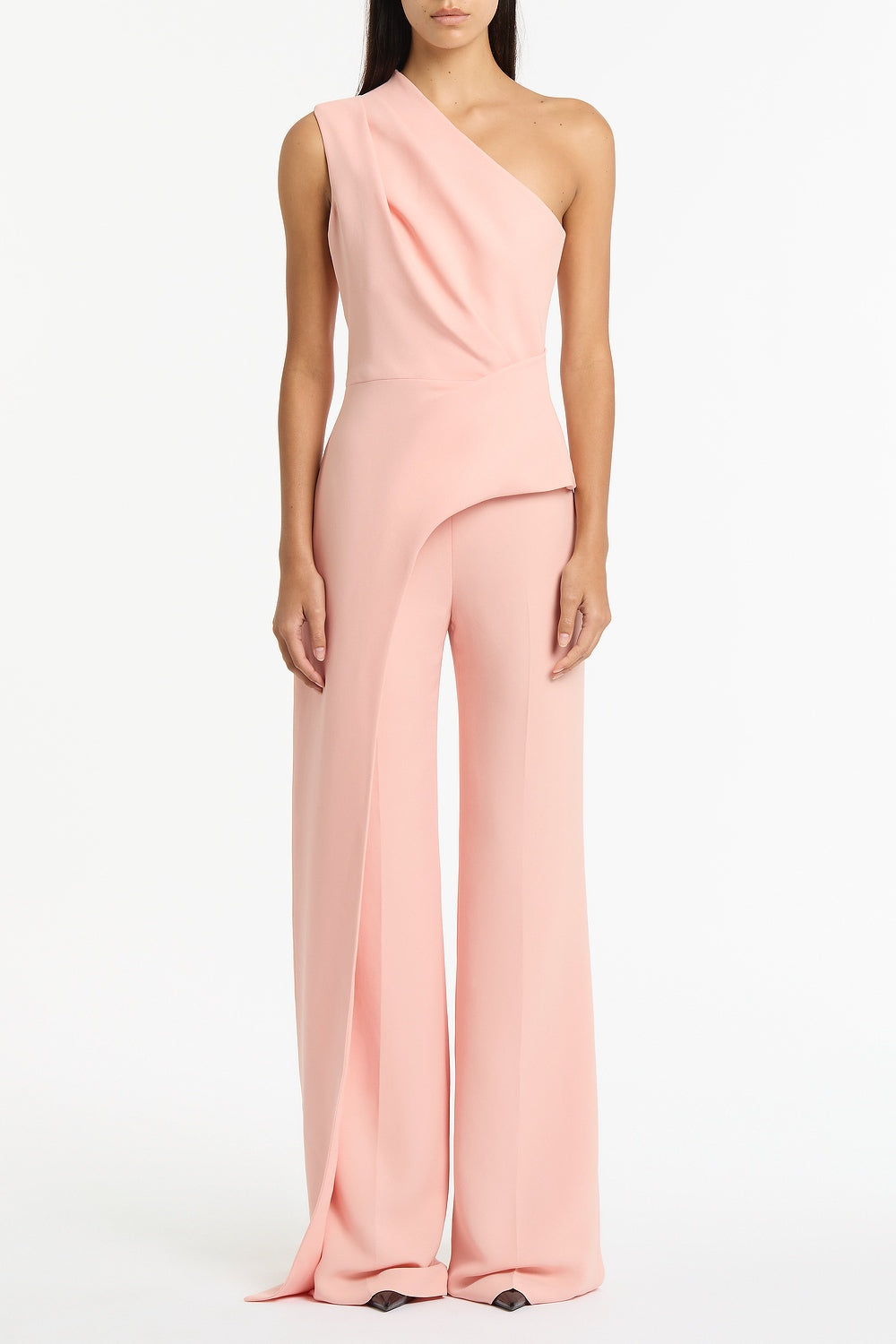 Image of a model wearing Tops. Product name - Pale Rose Crepe One Shoulder Longline Top in Pink colour by brand - Carla Zampatti