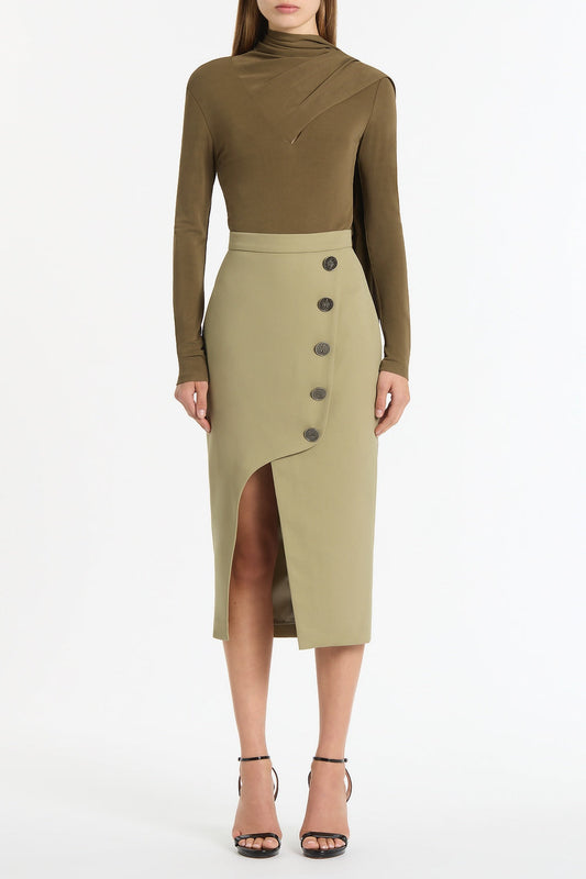 Image of a model wearing Tops. Product name - Palm Matte Jersey Long Sleeve Scarf Top in Green colour by brand - Carla Zampatti
