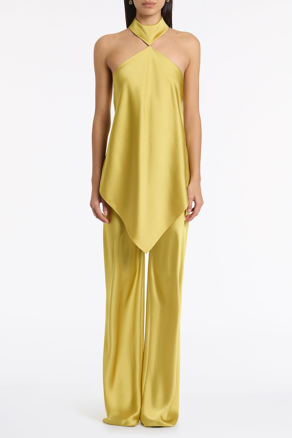 Image of a model wearing Tops. Product name - Pear Lustre Satin Neck Detail Top in Green colour by brand - Carla Zampatti