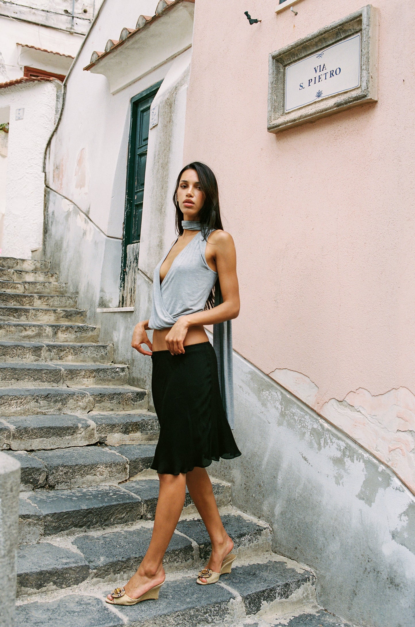 Image of a model wearing Skirts. Product name - Penny Skirt in Black colour by brand - With Jéan