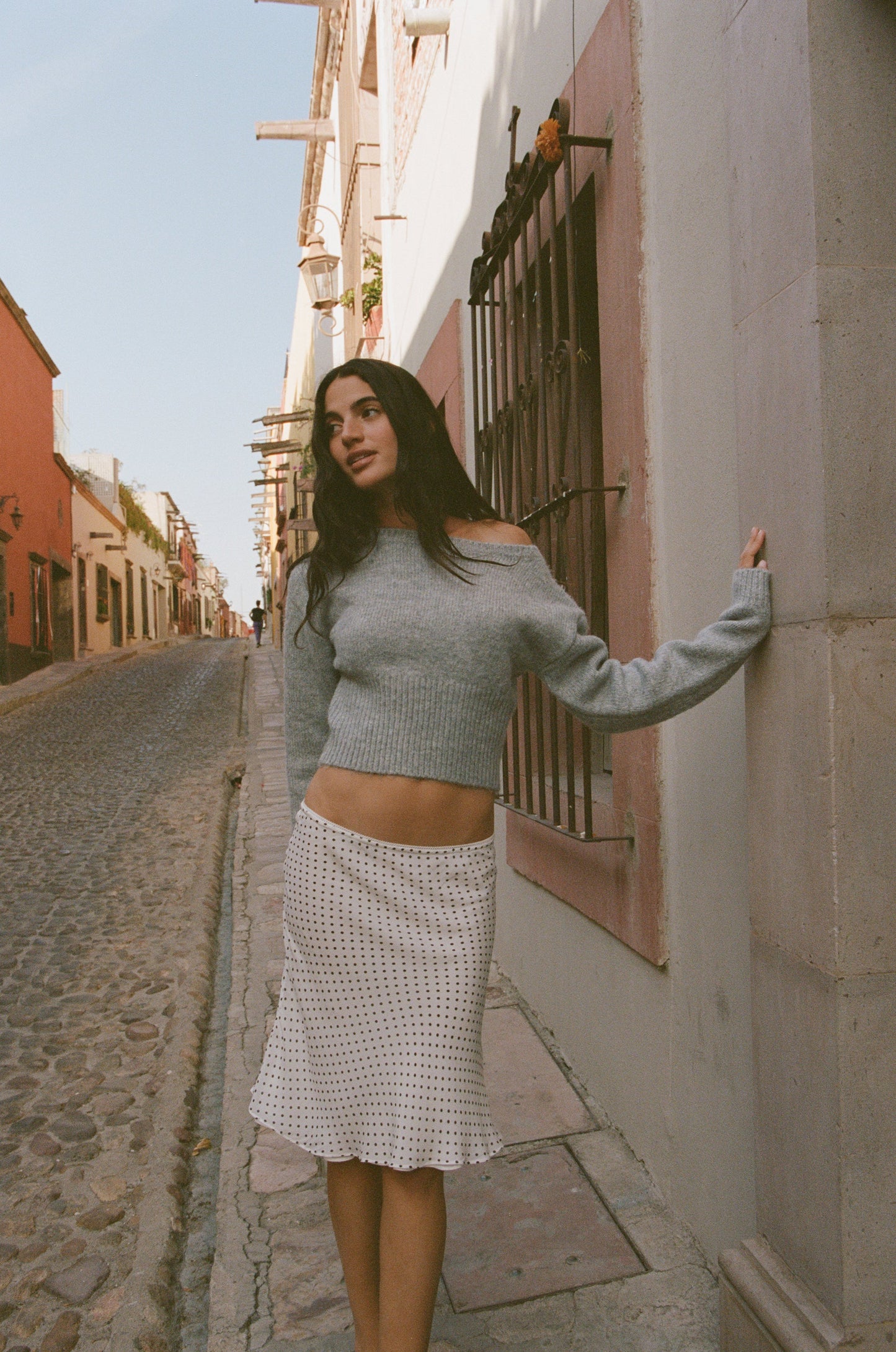 Image of a model wearing Skirts. Product name - Penny Skirt in Polka Dot colour by brand - With Jéan