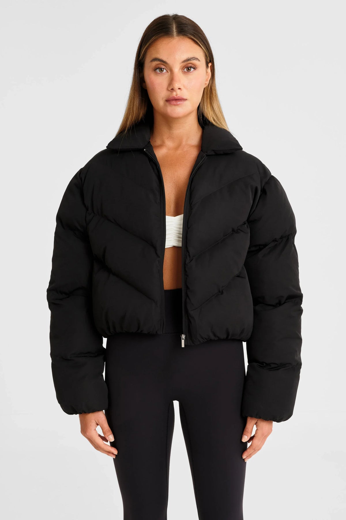 Image of Coats & Jackets. Product name - ALLFENIX Cropped Puffer Jacket in Black colour by brand - All Fenix