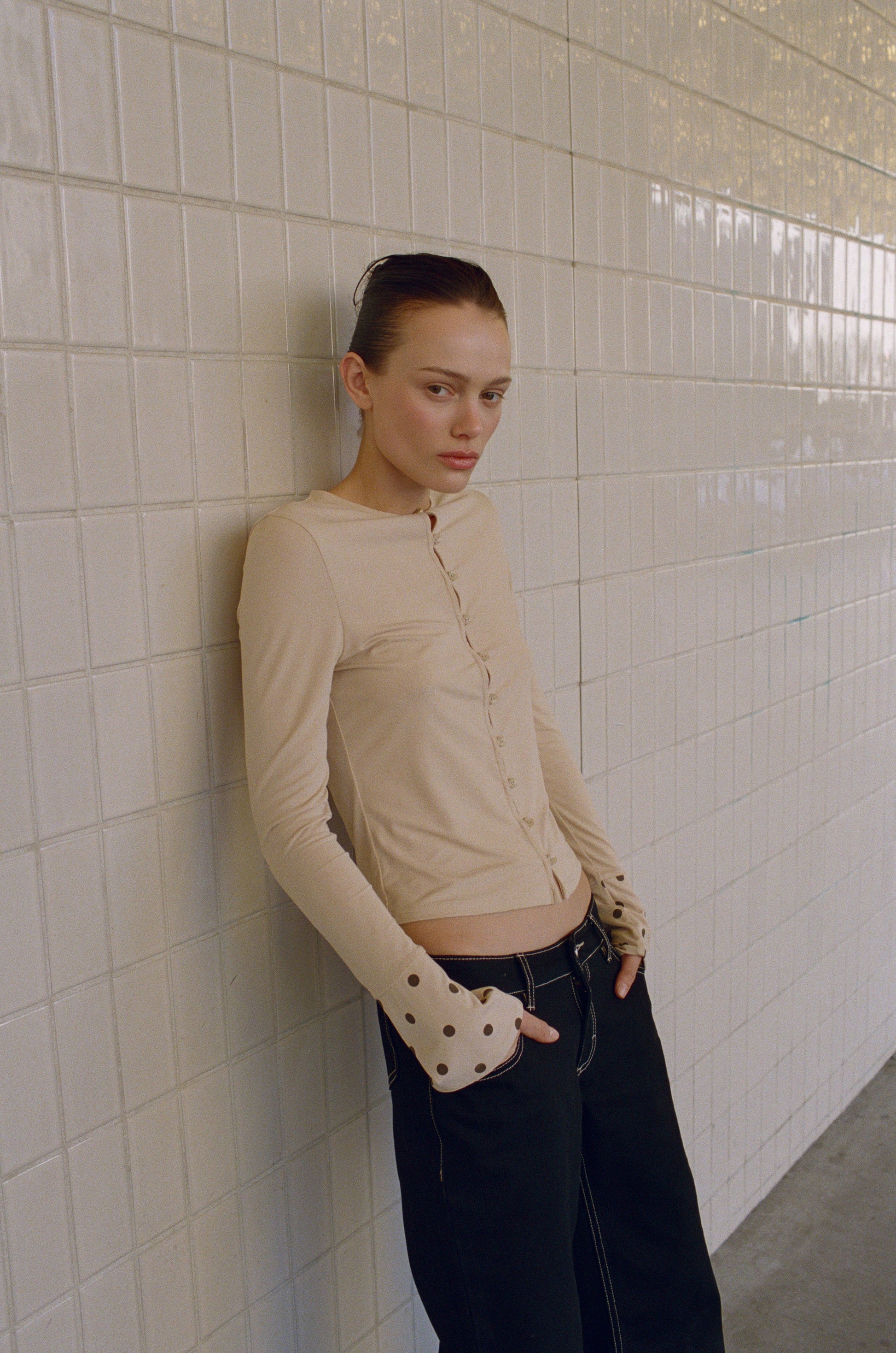 Image of a model wearing Tops. Product name - Pippa Top in Beige colour by brand - With Jéan
