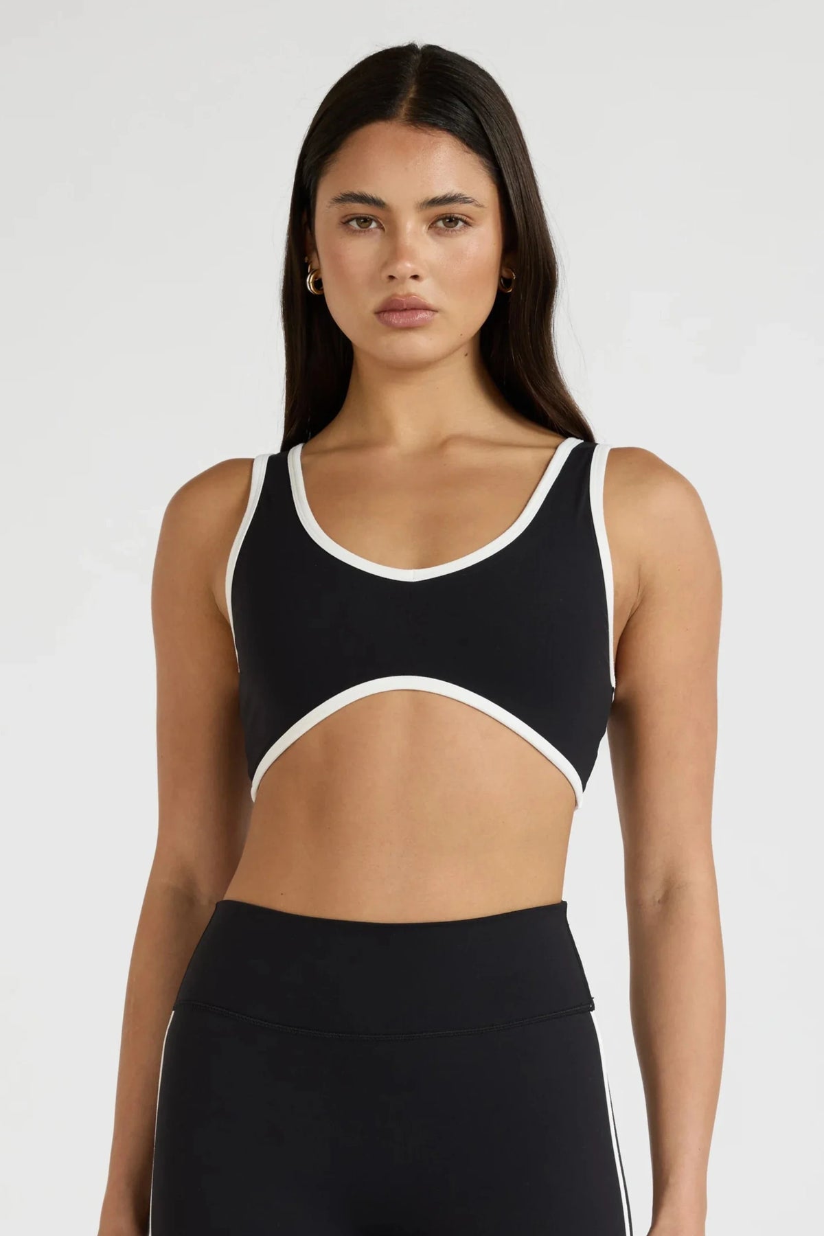 Image of Activewear. Product name - ALLFENIX CloudCore Hi Lo Sports Bra in Black colour by brand - All Fenix