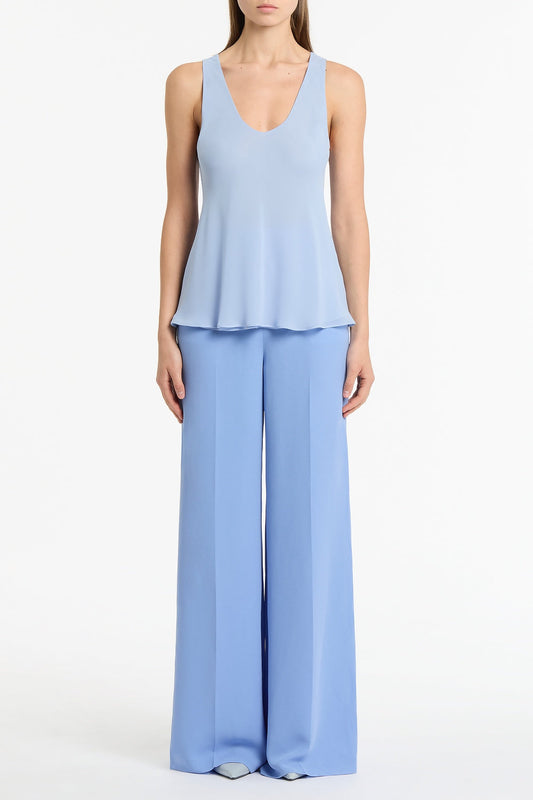 Image of a model wearing Tops. Product name - Powder Blue Georgette Scoop Cami in Blue colour by brand - Carla Zampatti