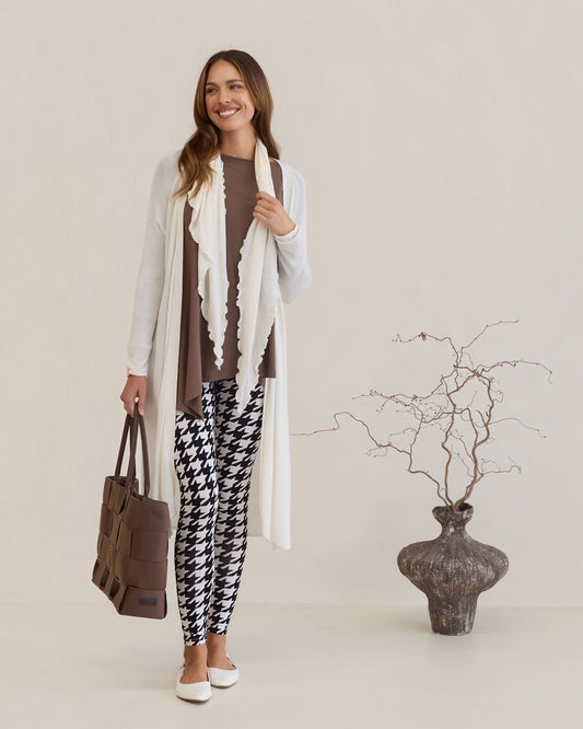 Image of a model wearing Pants. Product name - Luxe Bamboo Full-Length Legging Houndstooth in Houndstoth colour by brand - Lou Lou