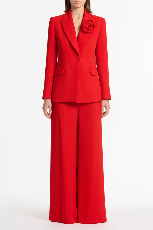 Image of a model wearing Pants. Product name - Red Crepe Palazzo Pant in Red colour by brand - Carla Zampatti