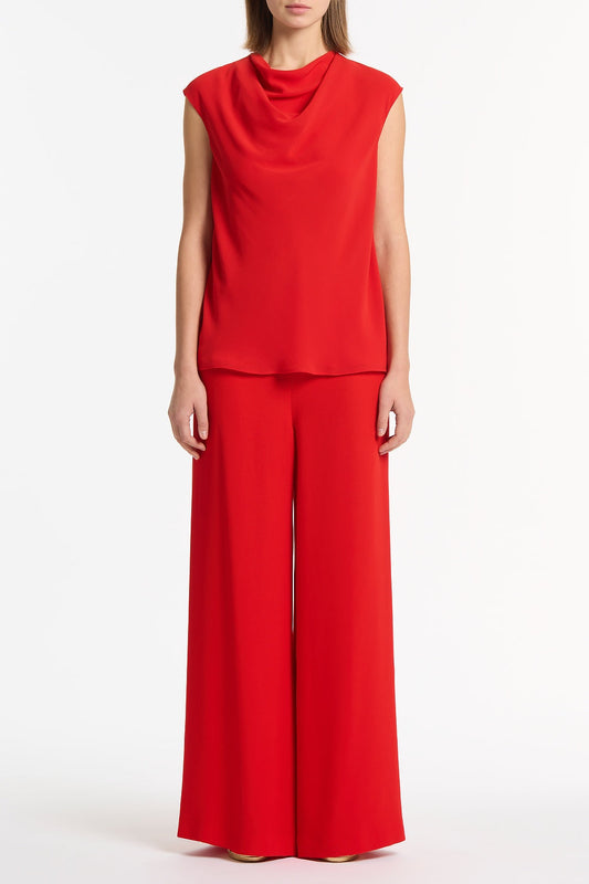 Image of a model wearing Tops. Product name - Red Georgette Cap Sleeve Cowl Top in Red colour by brand - Carla Zampatti