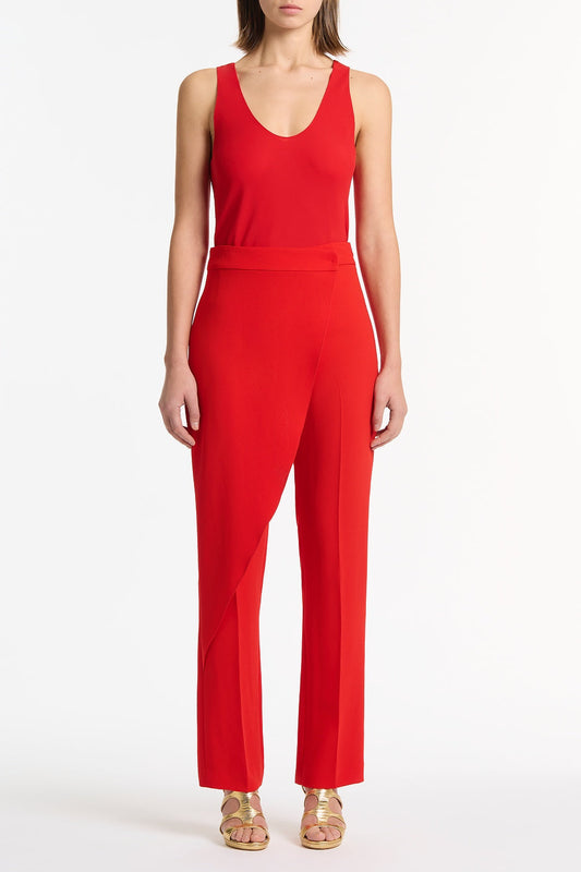 Image of a model wearing Tops. Product name - Red Georgette Scoop Neck Cami in Red colour by brand - Carla Zampatti