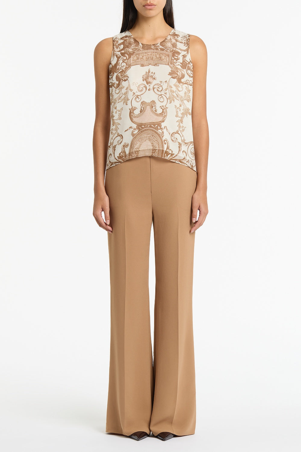 Image of a model wearing Tops. Product name - Renaissance Georgette Cami in Natural colour by brand - Carla Zampatti