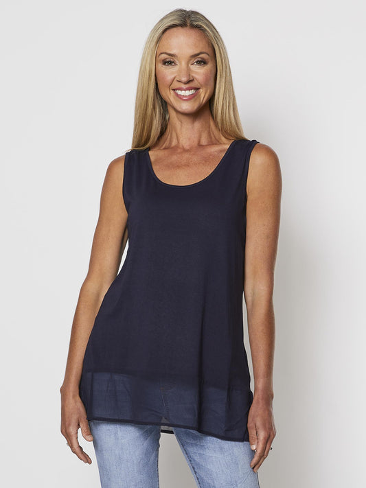 Image of a model wearing Tops. Product name - Reversible Tank Navy in Navy colour by brand - Threadz