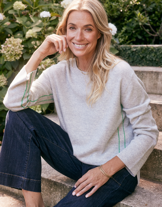 Image of a model wearing Outerwear. Product name - Riviera Wool Cashmere Knit Grey Marle in Grey Marle colour by brand - White & Co.