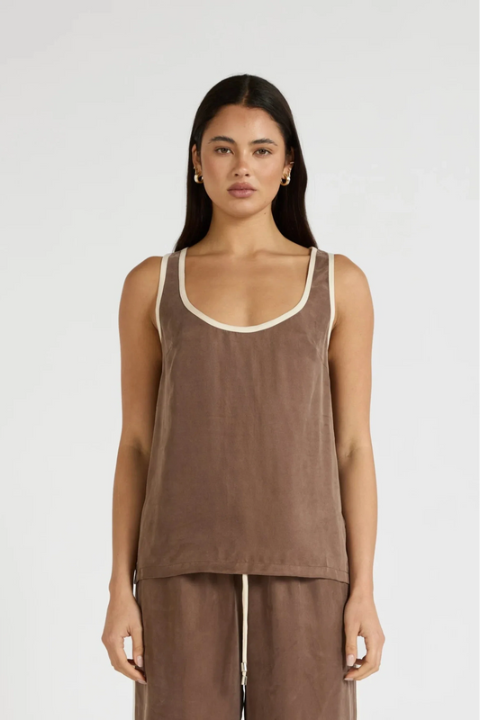 Image of a model wearing Tops. Product name - Cupro Contrast Tank in Latte colour by brand - All Fenix