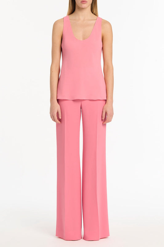 Image of a model wearing Tops. Product name - Rose Pink Georgette Scoop Neck Cami in Pink colour by brand - Carla Zampatti