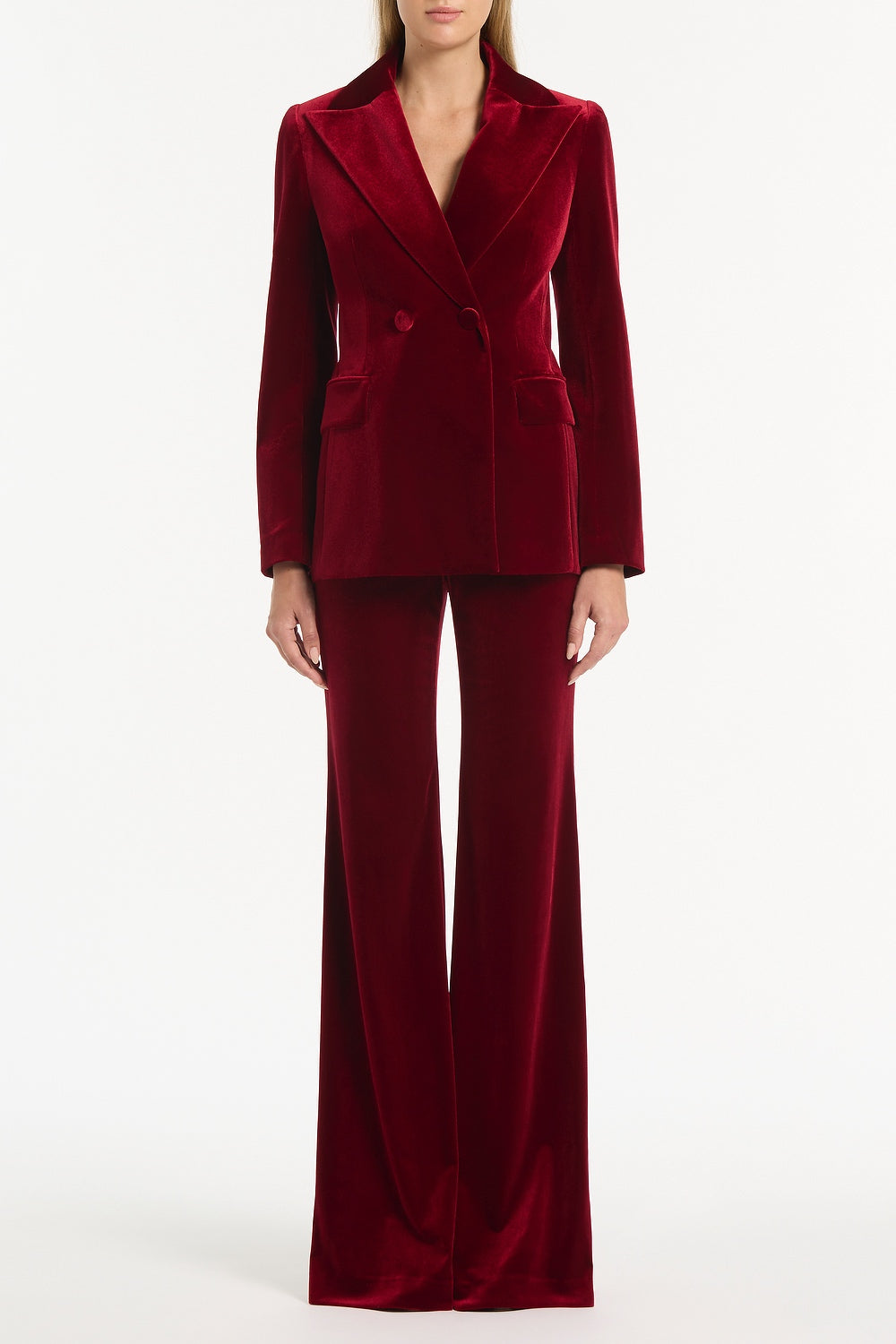 Image of a model wearing Pants. Product name - Rouge Velvet Wide Leg Pant in Red colour by brand - Carla Zampatti
