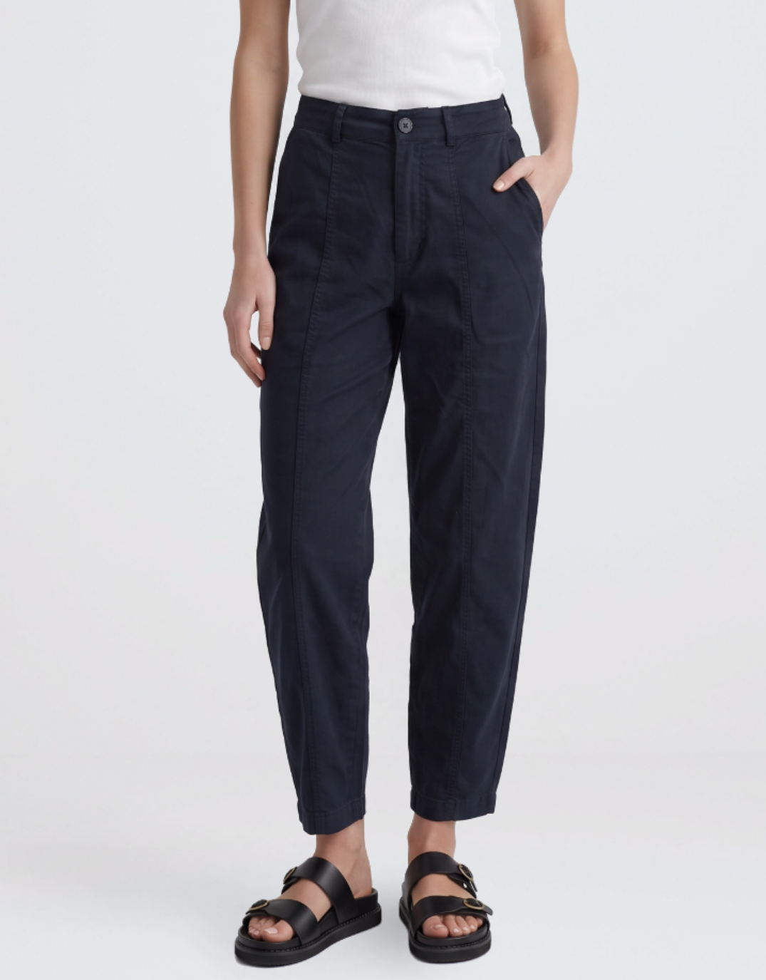 Image of a model wearing Pants. Product name - Roy Pant Black in Black colour by brand - Foxwood