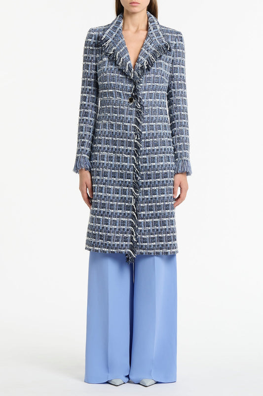 Image of a model wearing Outerwear. Product name - Royal Metallic Check Tweed Fringed Coat in Blue colour by brand - Carla Zampatti