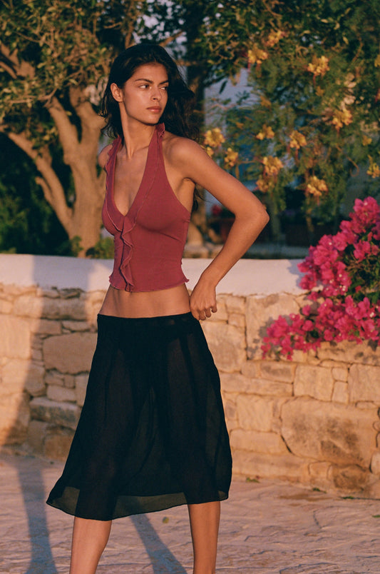 Image of a model wearing Tops. Product name - Ruby Top in Plum colour by brand - With Jéan