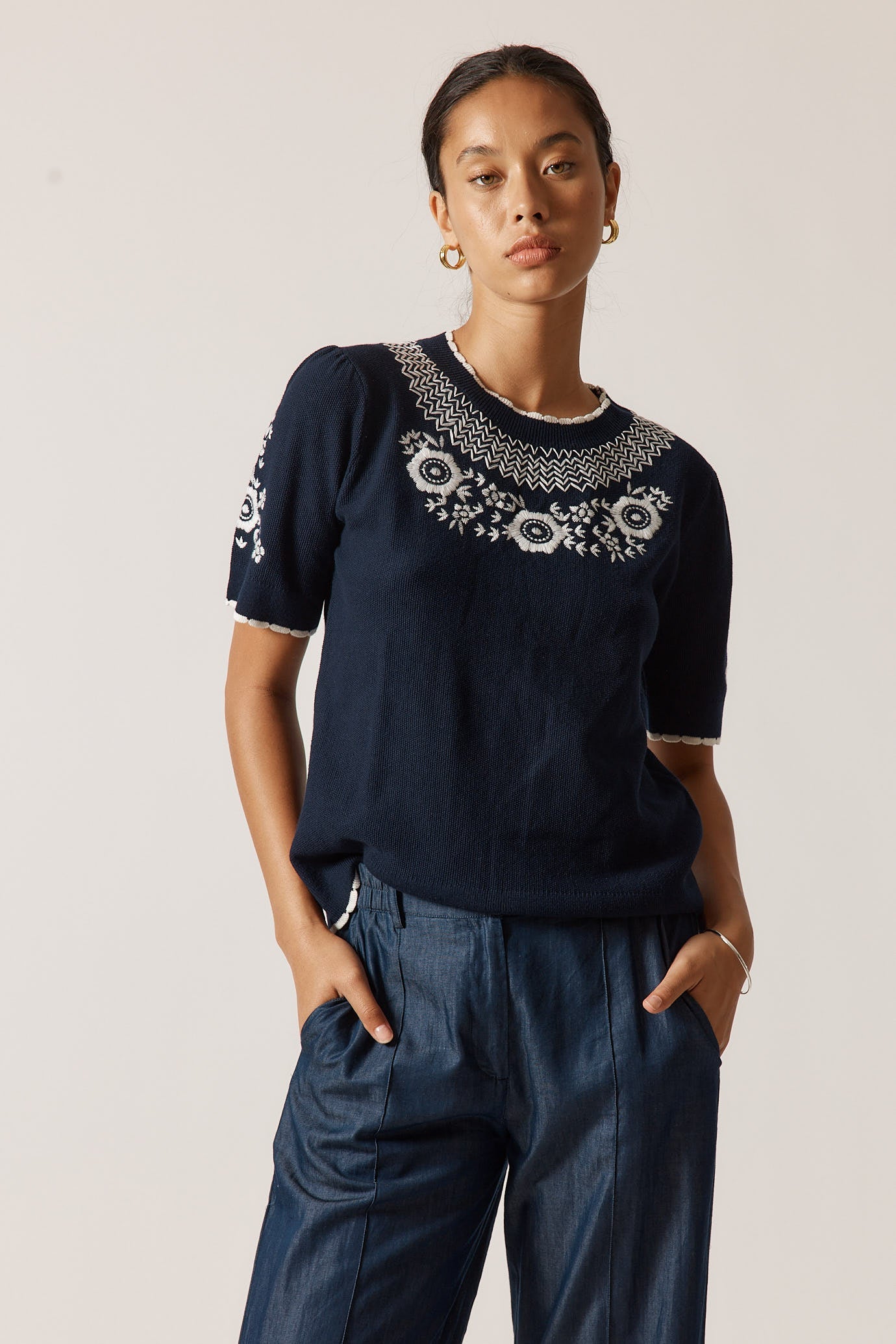 Image of a model wearing Outerwear. Productname: Rubyyaya Ariel Sweater Navy in Navy colour by brand - Rubyyaya