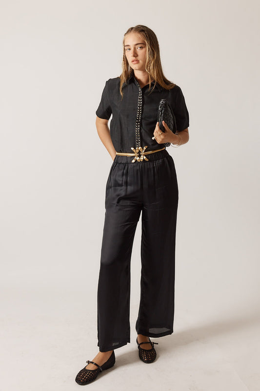 Image of a model wearing Pants. Productname: PRE SALE | Rubyyaya Como Pant Black in Black colour by brand - Rubyyaya