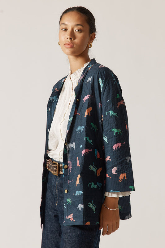 Image of a model wearing Outerwear. Product name - Rubyyaya Funky Cats Coat in Oat colour by brand - Rubyyaya
