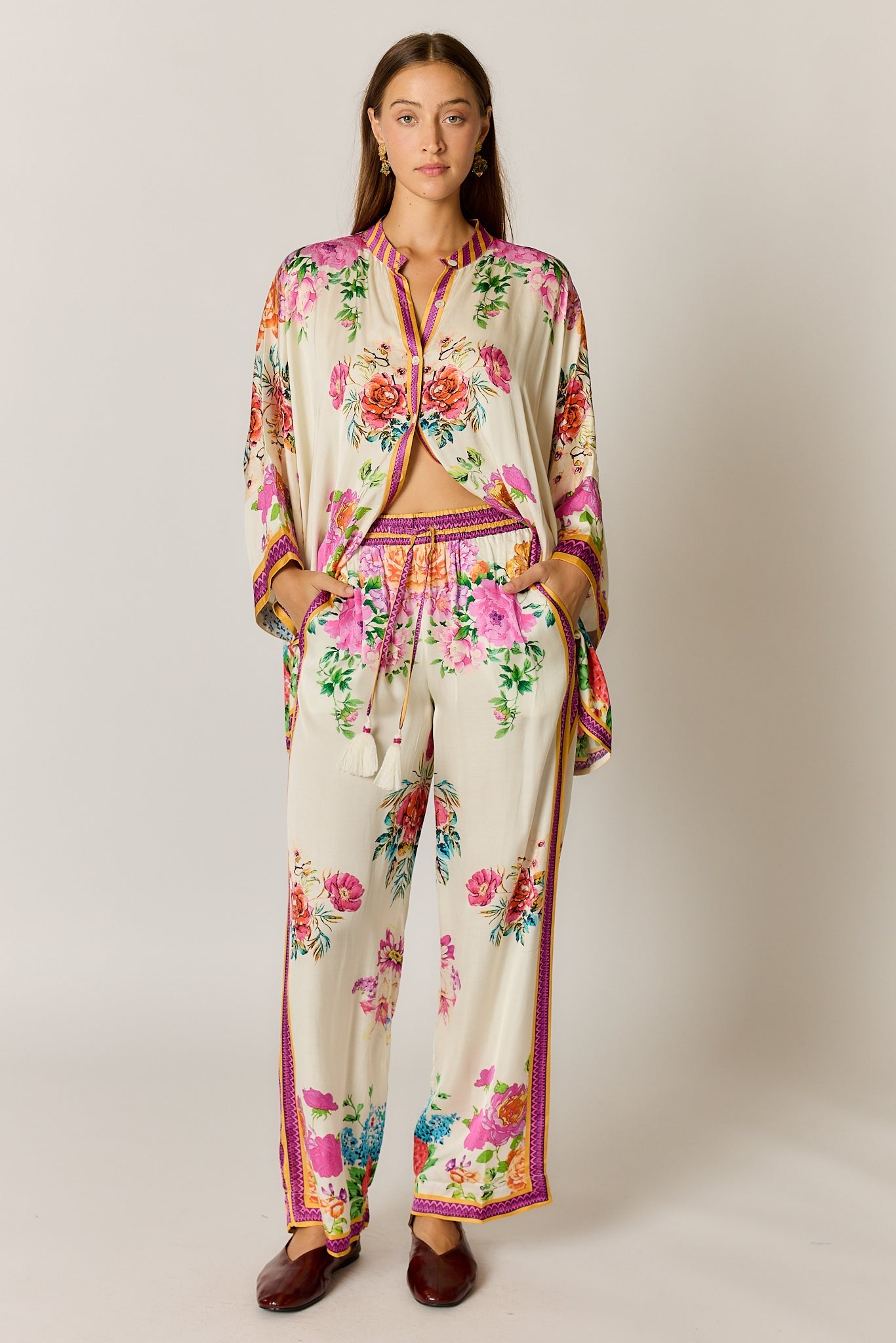 Image of a model wearing Pants. Product name - PRE SALE | Rubyyaya Liberte Pant Cream in Cream colour by brand - Rubyyaya