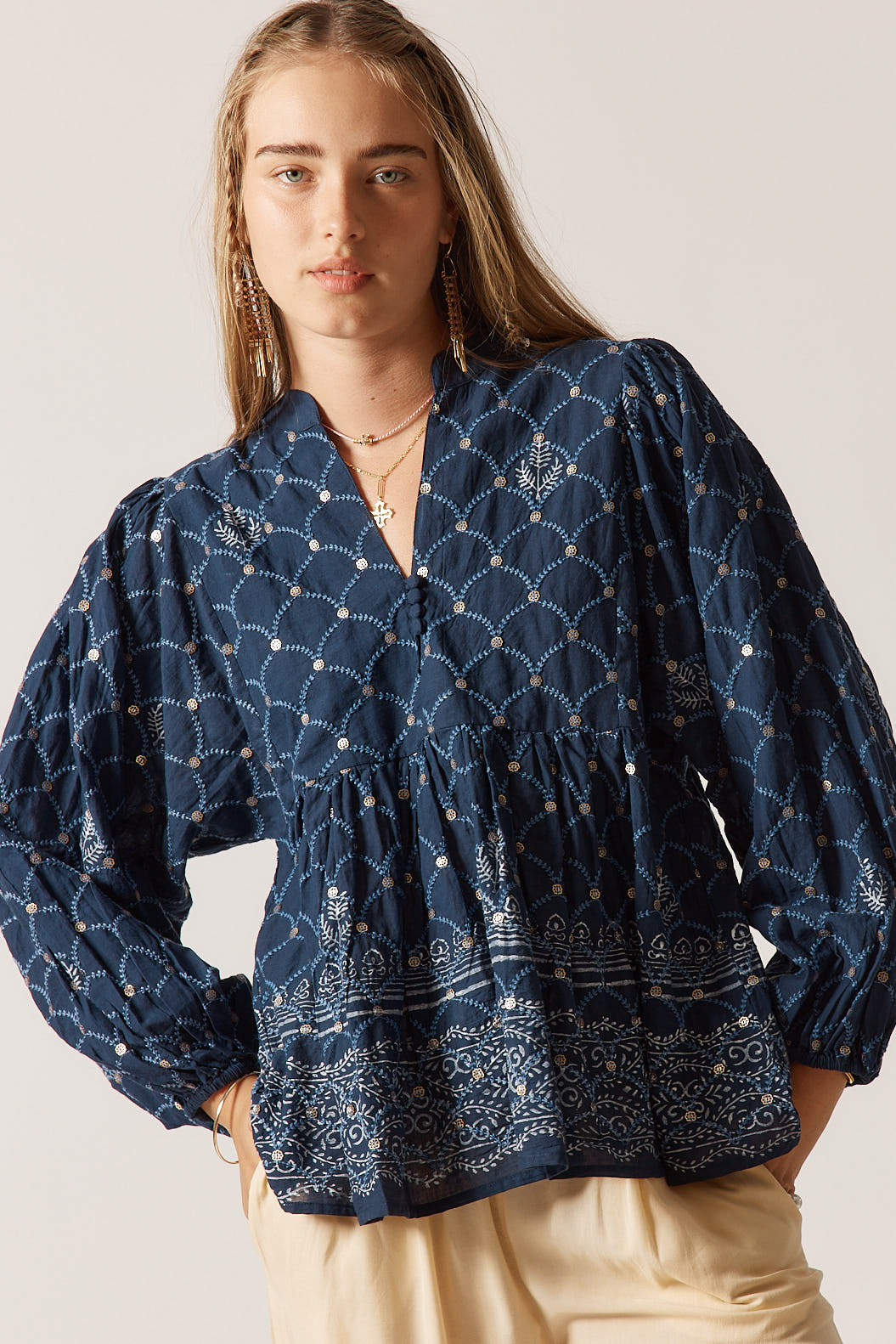 Image of a model wearing Tops. Product name - Rubyyaya Locket of Love Top Navy in Navy colour by brand - Rubyyaya