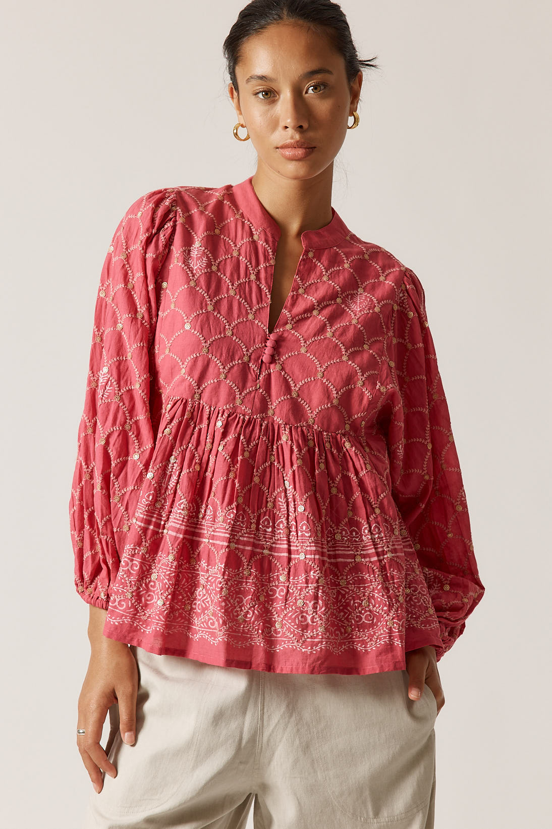 Image of a model wearing Tops. Product name - Rubyyaya Locket of Love Top Pink in Pink colour by brand - Rubyyaya
