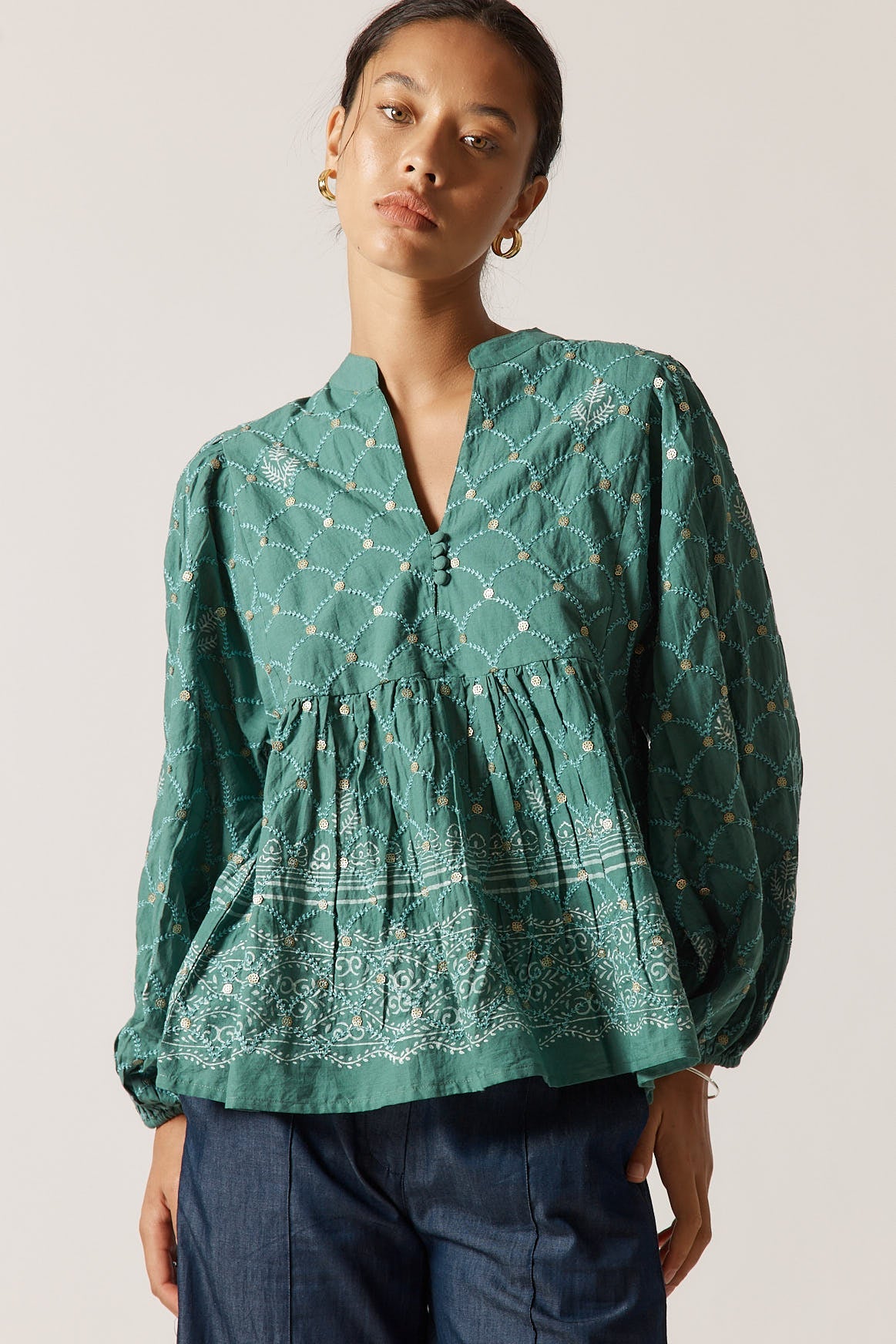 Image of a model wearing Tops. Product name - Rubyyaya Locket of Love Top Sage in Sage colour by brand - Rubyyaya