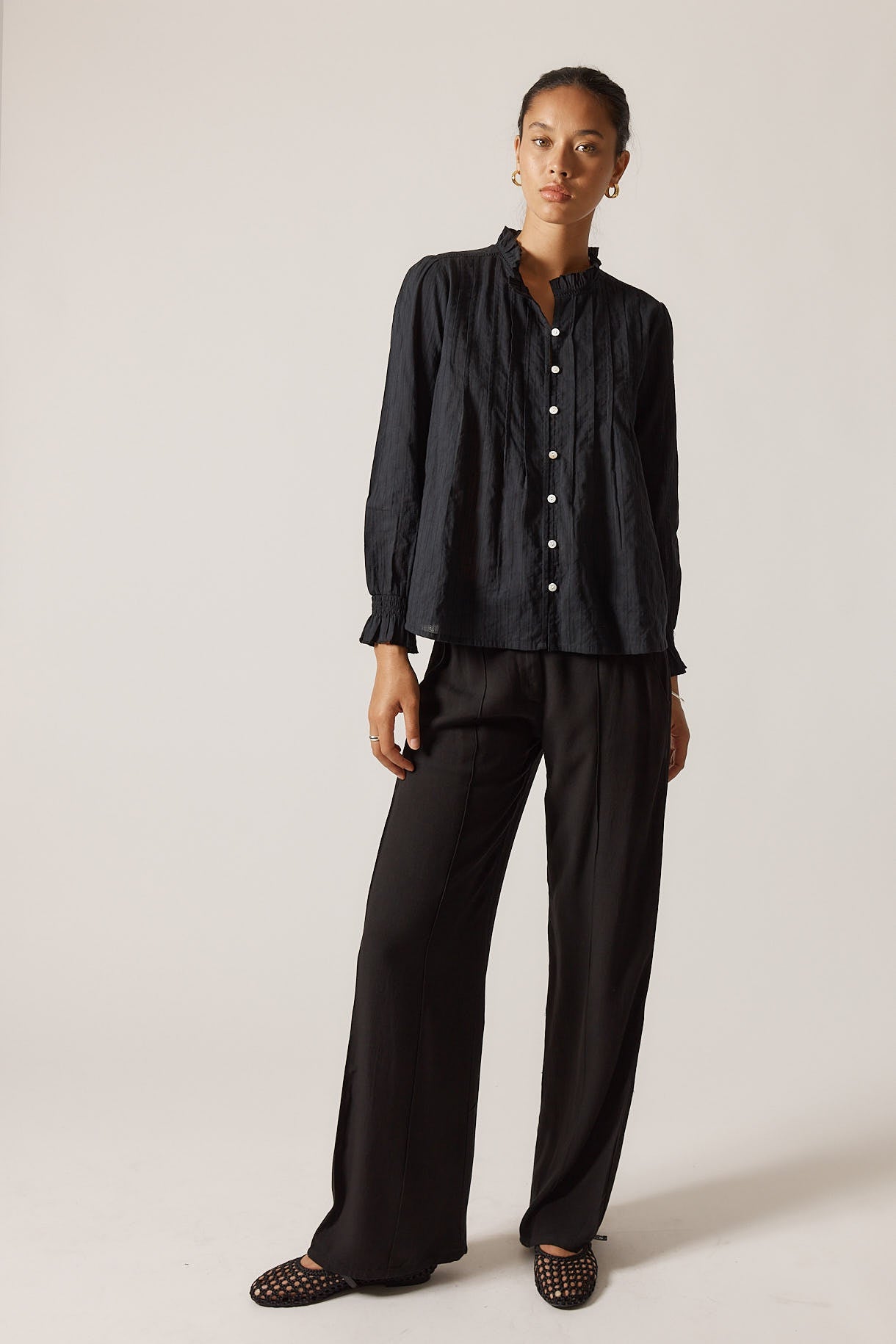 Image of a model wearing Pants. Productname: Rubyyaya Lucinda Pant Black in Black colour by brand - Rubyyaya