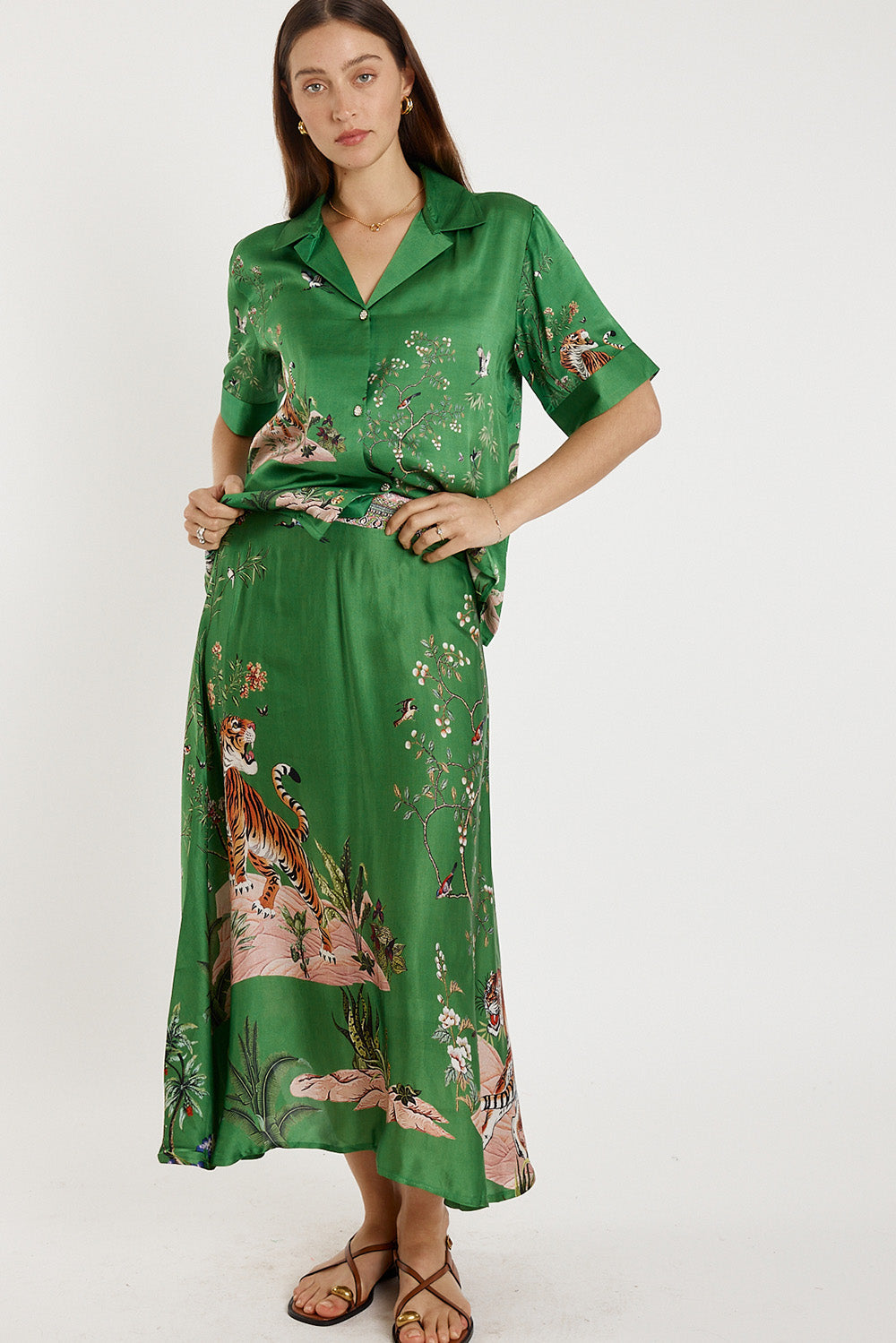 Image of a model wearing Skirts. Product name - Rubyyaya Machali Skirt Emerald in Emerald colour by brand - Rubyyaya