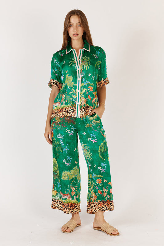 Image of a model wearing Pants. Product name - Rubyyaya Mataram Pant Emerald in Emerald colour by brand - Rubyyaya