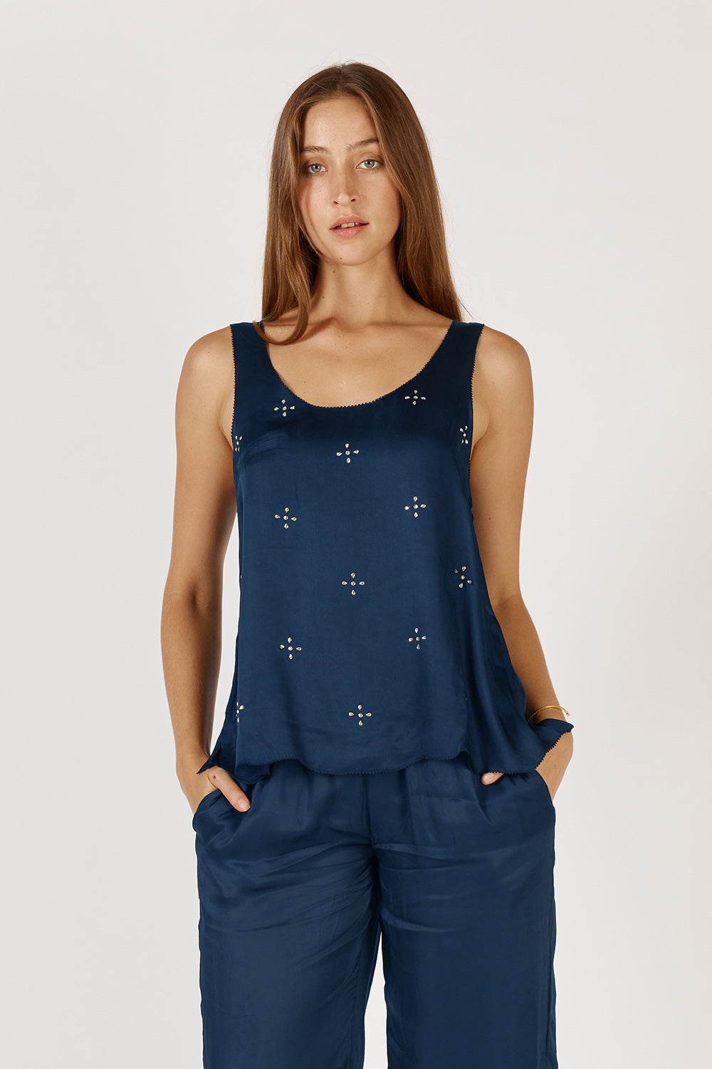 Image of a model wearing Tops. Product name - Rubyyaya Munchen Singlet Navy in Navy colour by brand - Rubyyaya