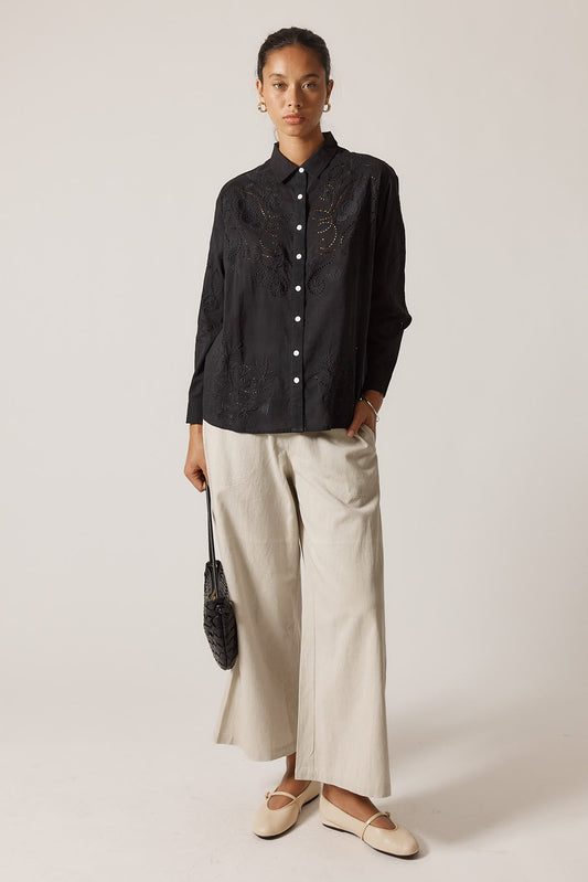Image of a model wearing Pants. Product name - Rubyyaya Pula Pant Natural in Natural colour by brand - Rubyyaya