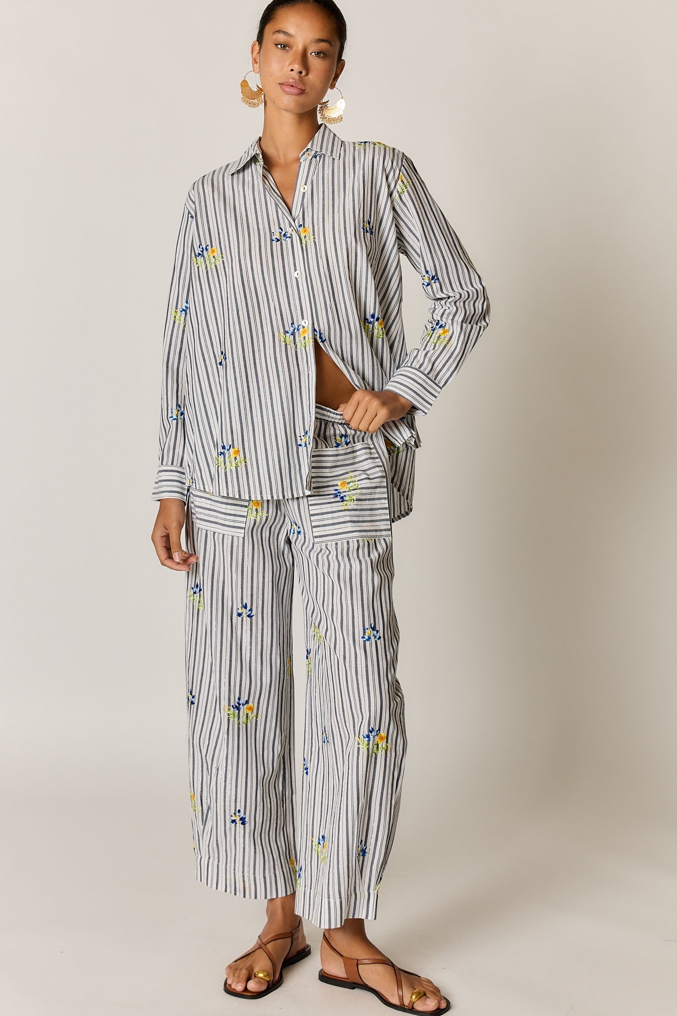 Image of a model wearing Pants. Product name - Rubyyaya St Tropez Pant Stripe in Stripe colour by brand - Rubyyaya