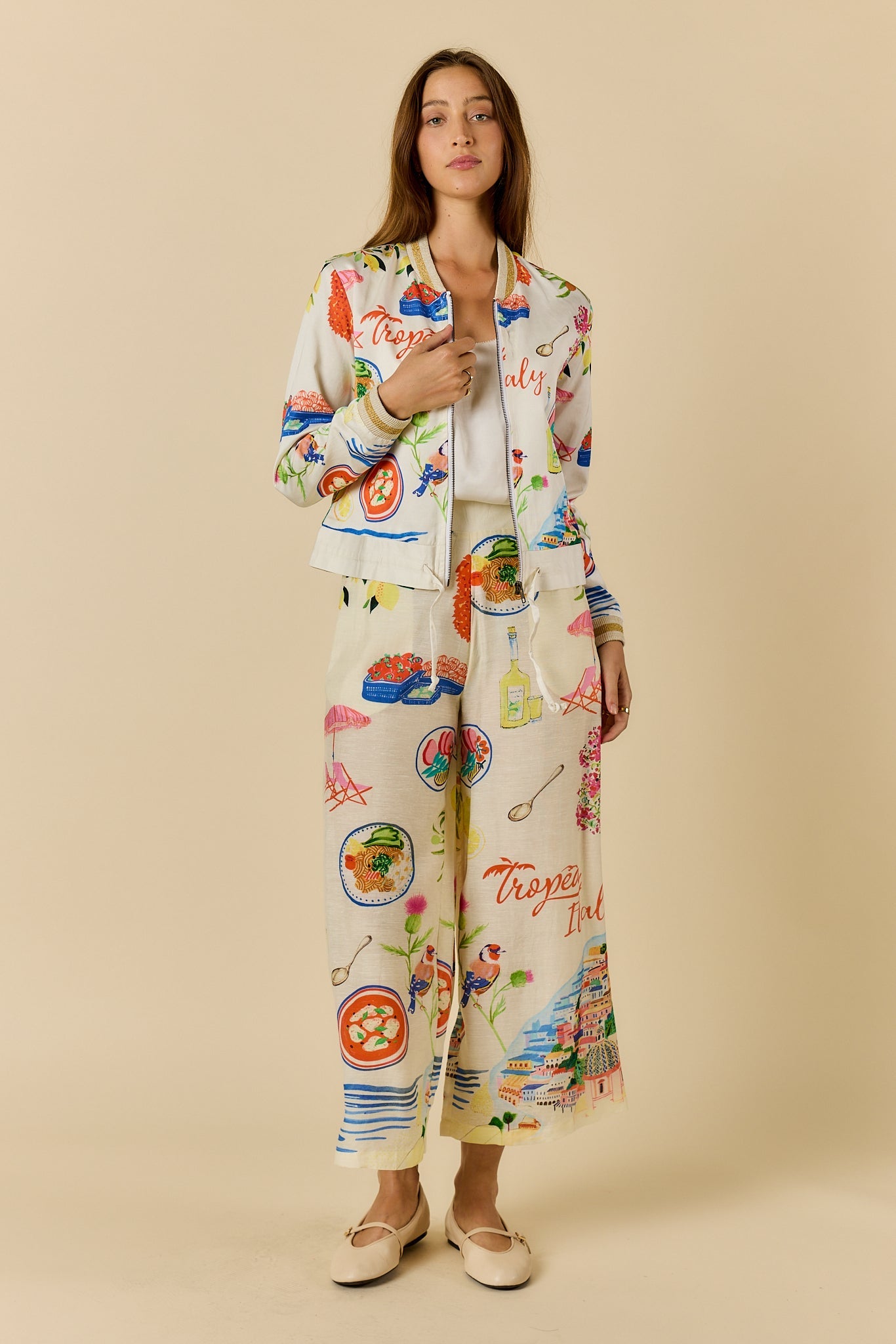 Image of a model wearing Pants. Product name - Rubyyaya Tropea Pant Print in Print colour by brand - Rubyyaya