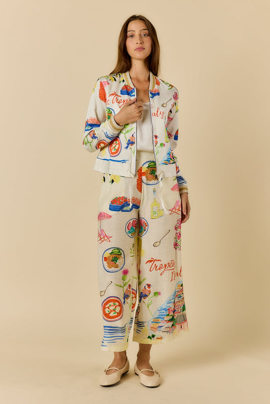 Image of a model wearing Pants. Product name - Rubyyaya Tropea Pant Print in Print colour by brand - Rubyyaya