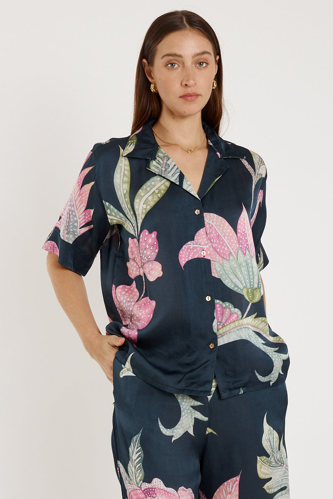 Image of a model wearing Tops. Product name - Rubyyaya Ubud Top Navy in Navy colour by brand - Rubyyaya