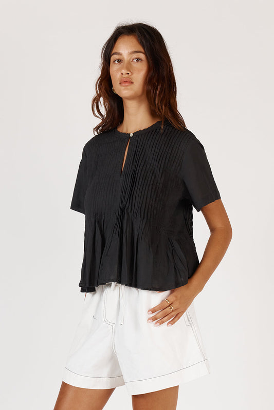 Image of a model wearing Tops. Product name - Rubyyaya Vivian Top Black in Black colour by brand - Rubyyaya