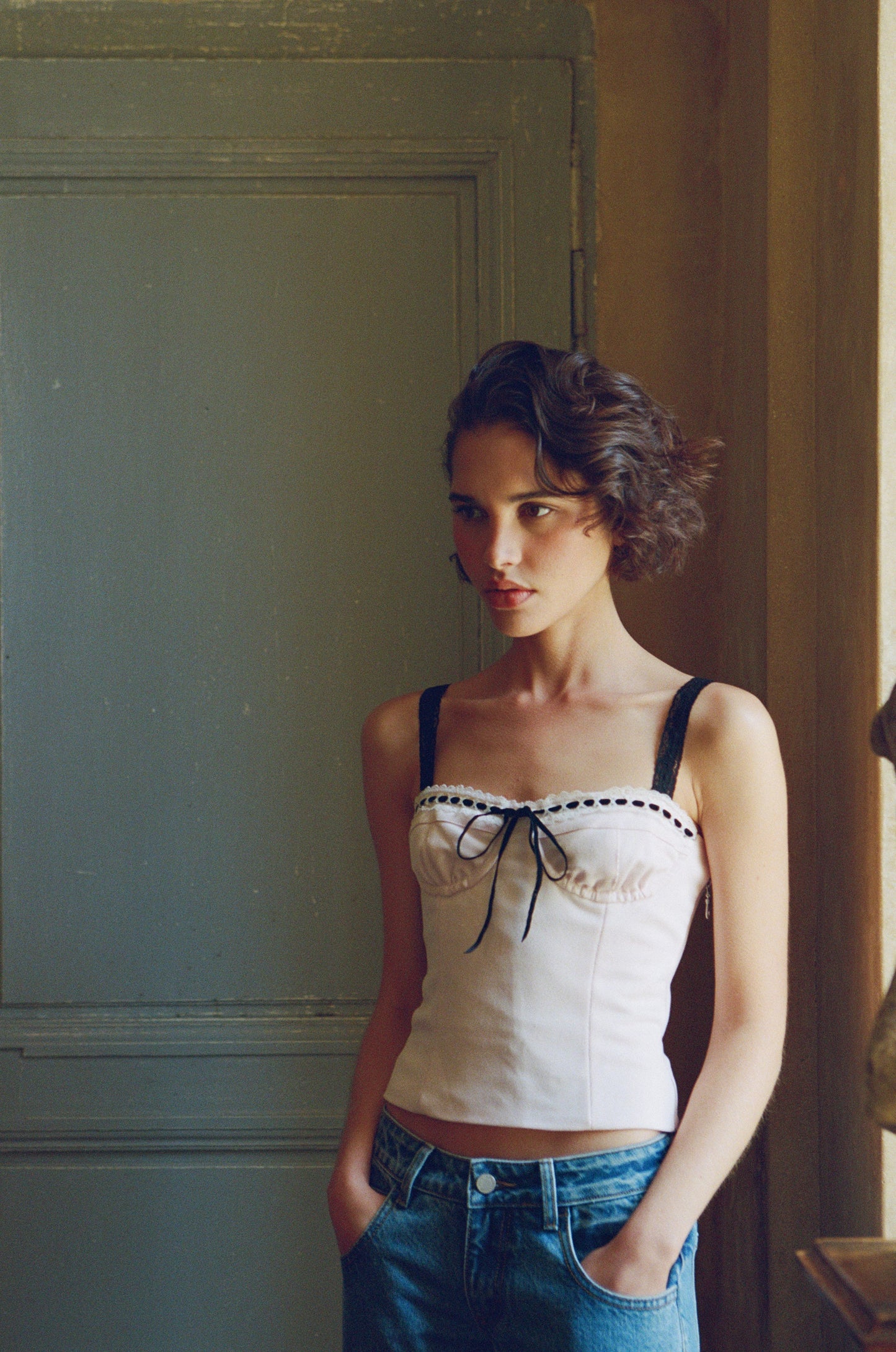 Image of a model wearing Tops. Product name - Ryder Top in Baby Pink colour by brand - With Jéan