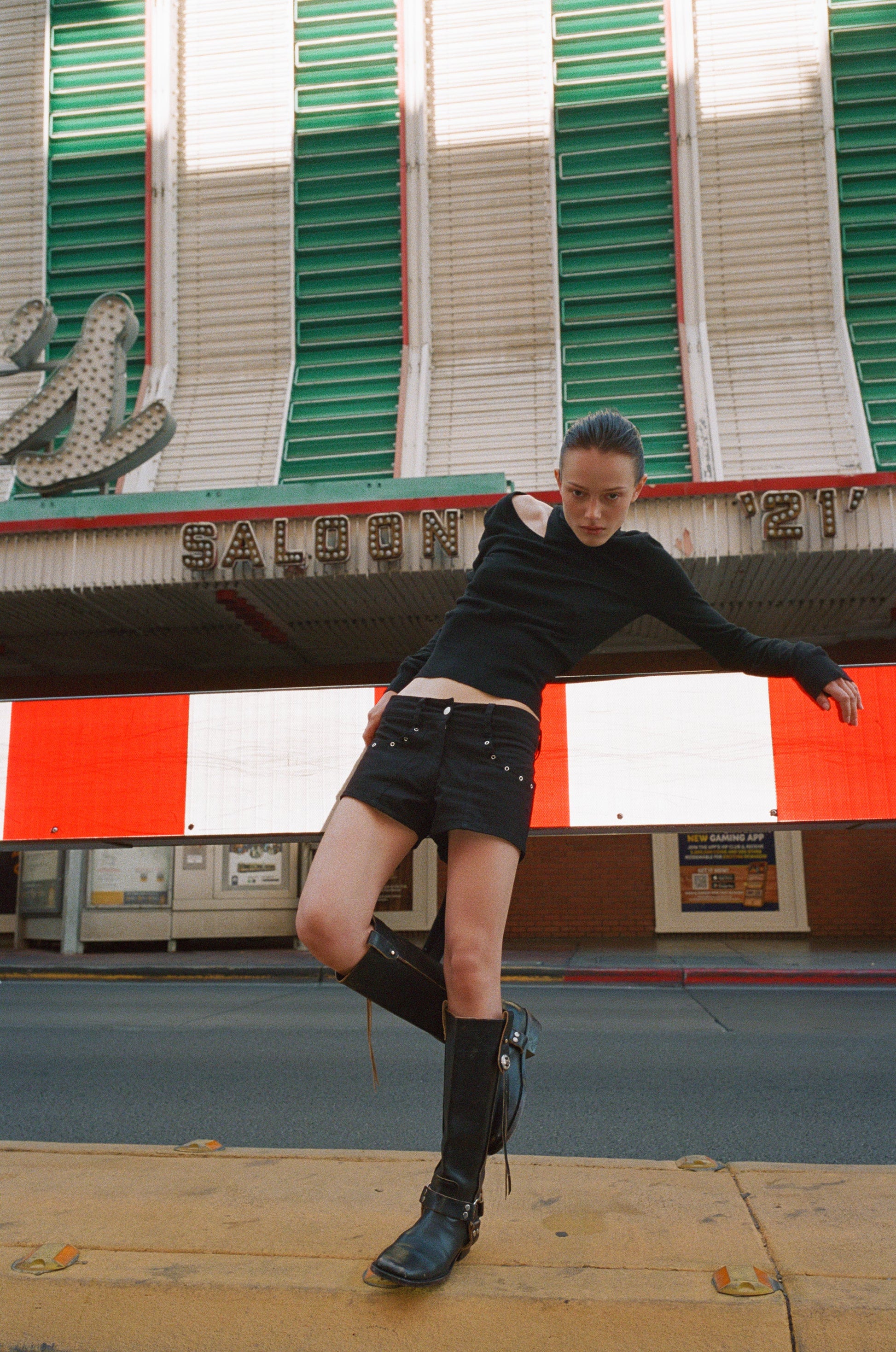 Image of a model wearing Shorts. Product name - Ryley Shorts in Black colour by brand - With Jéan