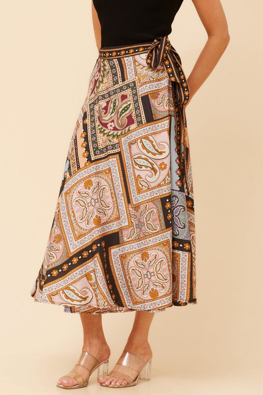 Image of a model wearing Skirts. Product name - IVONE TRUE WRAP MAXI SKIRT in Multi colour by brand - Caroline Morgan Australia