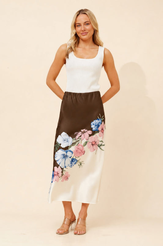 Image of a model wearing Skirts. Product name - LIANY FLORAL MAXI SKIRT in Chocolate colour by brand - Caroline Morgan Australia